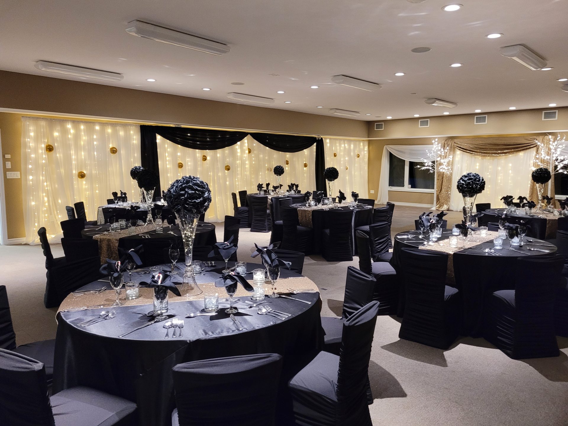 Corporate events catering - elegant black and gold reception hall in North Bay