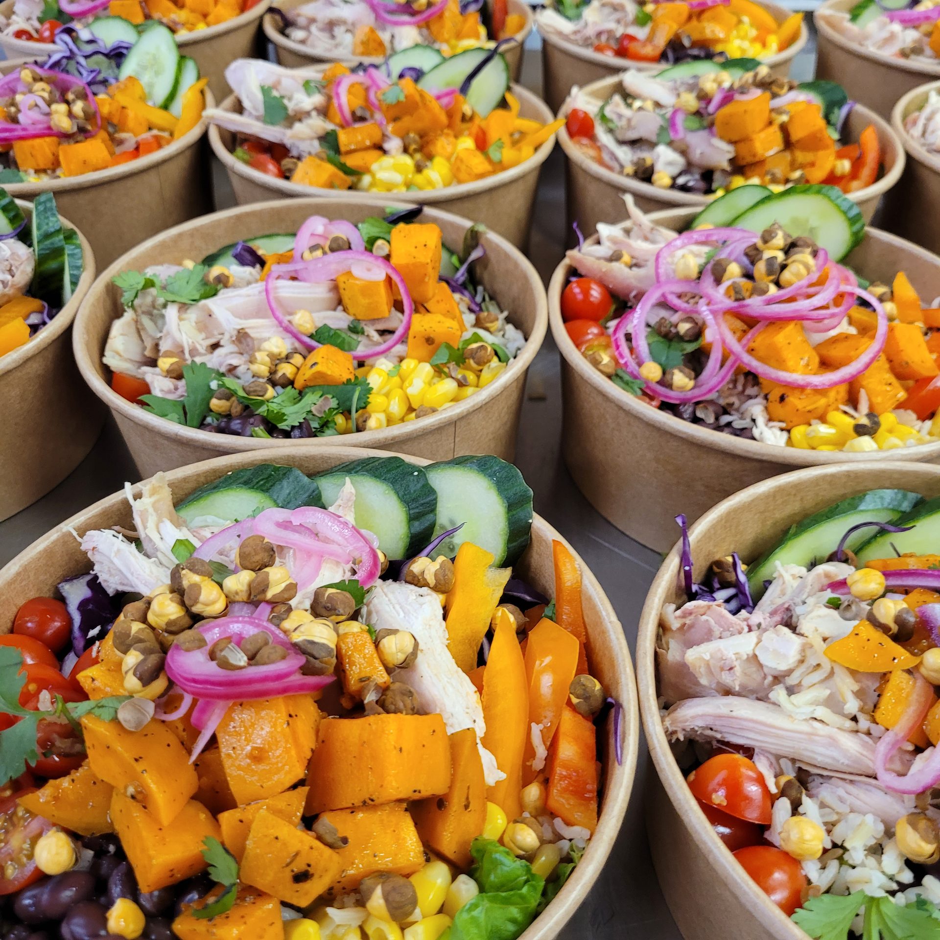 Custom chicken and sweet potato grain bowls for dietary-inclusive catering