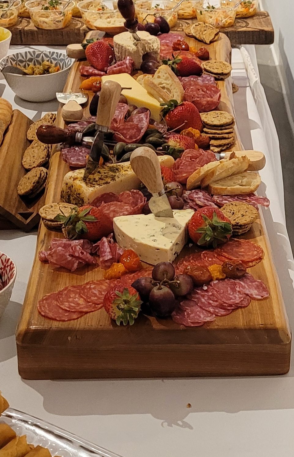 Savoir Faire Custom Catering signature charcuterie grazing board
