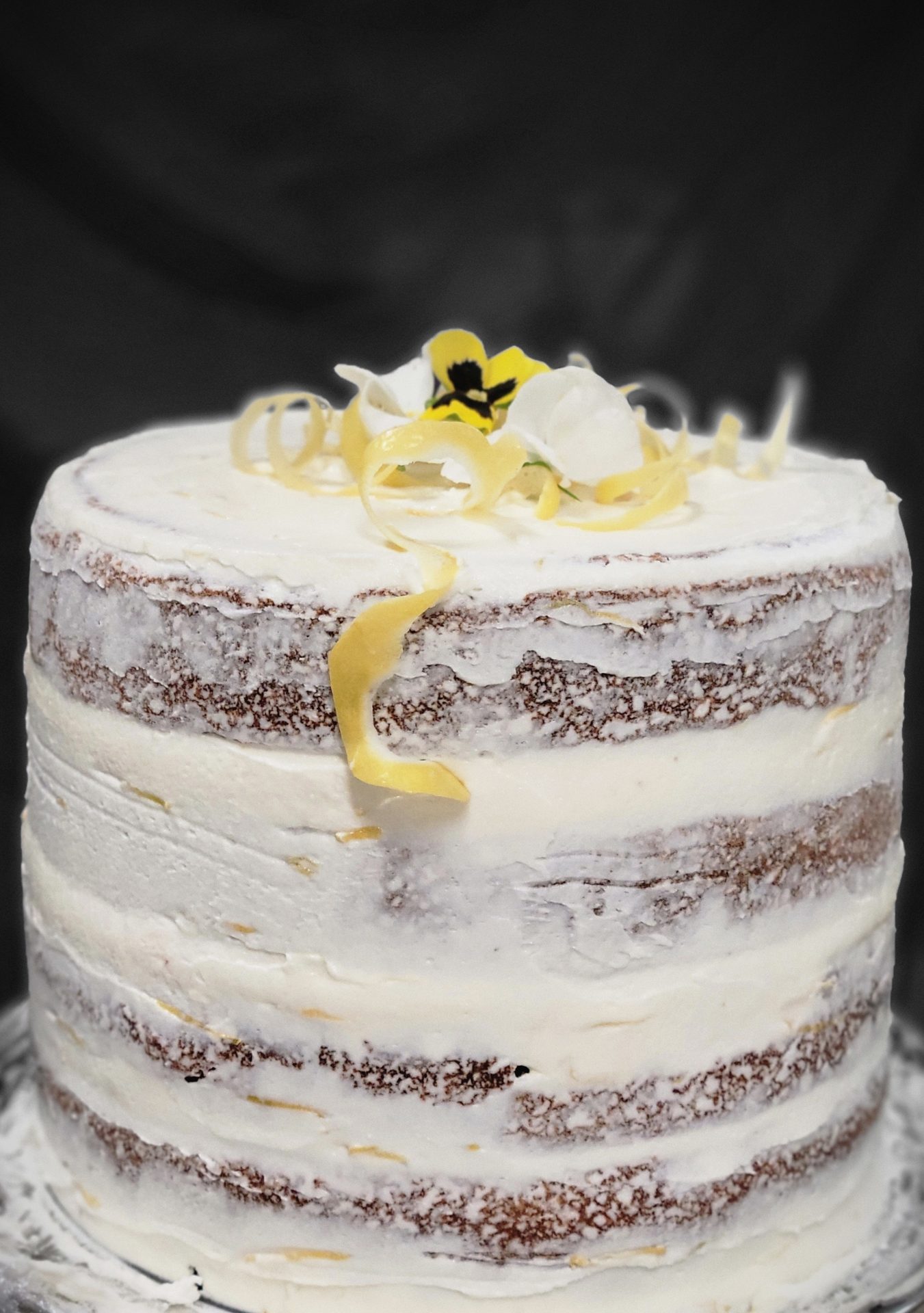 Wedding catering - naked lemon cake with edible flowers by Savoir Faire Custom Catering
